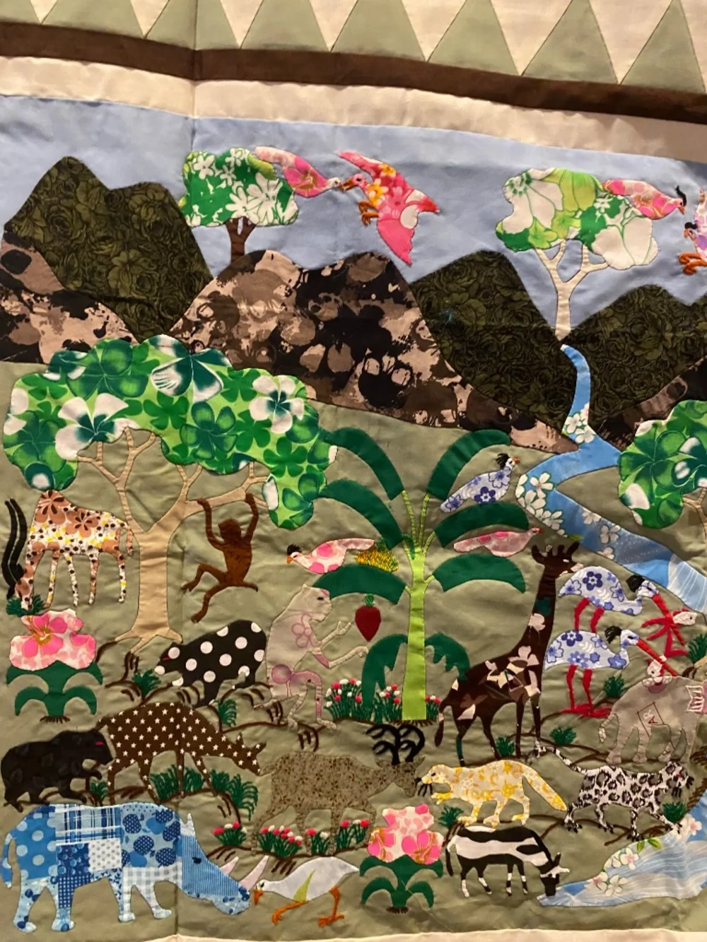 Quilt-style wall hanging with animal designs for decorating a child's room (New)